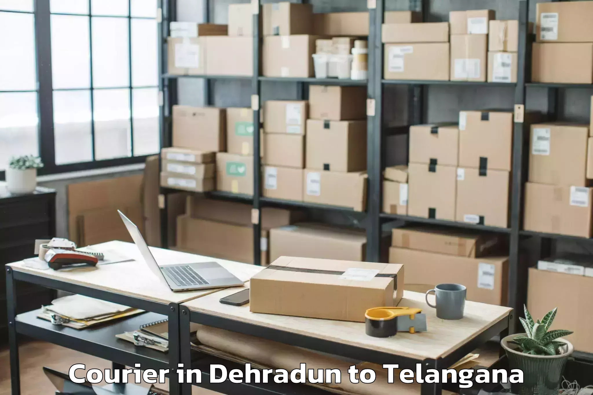 Trusted Dehradun to Bellampalle Courier